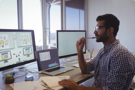 thoughtful-businessman-working-at-office